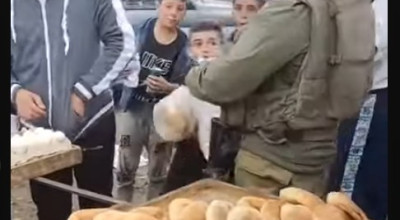 فيديو الجندي الاسرائيلي يشتري الخبز بفلسطين